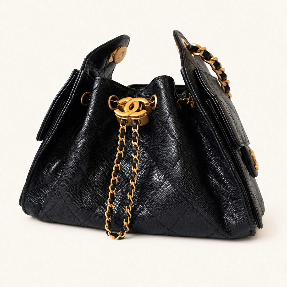 C25 Mini Black GHW — product preview on cream background